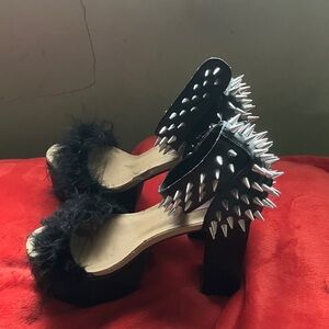 Never been worn . Black Spiked Platform Heels